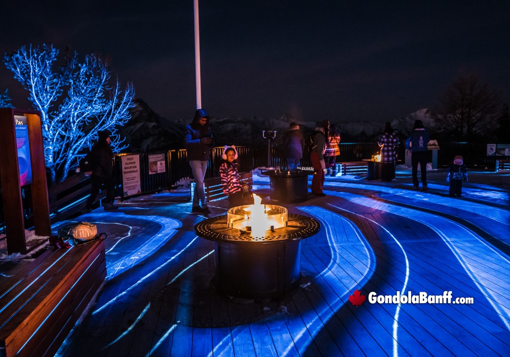 Banff Gondola Nightrise Patio Light Show with Blue Waves
